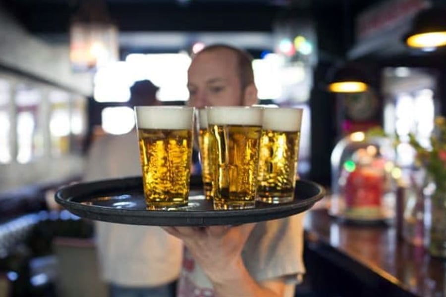 Bartender Serving Beer