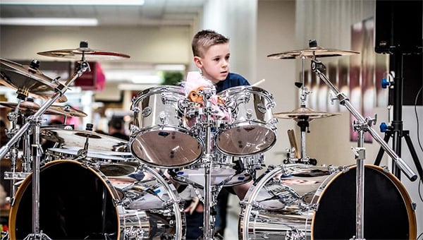 Kid Playing The Drums